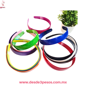 Bolsa con 12 Diademas de plÂ stico en colores 2.5 cm de ancho 