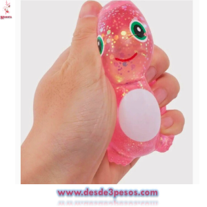 Squishi  Dinosaurio de gel con Glitter en colores  8 x 7cm.